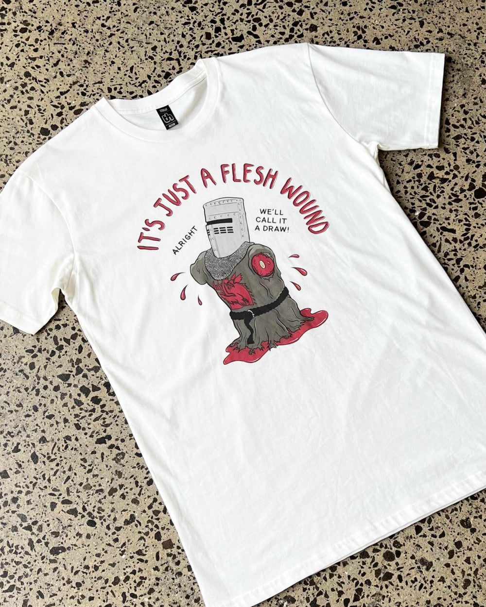 It's Just a Flesh Wound T-Shirt Europe Online #colour_natural